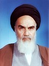 https://upload.wikimedia.org/wikipedia/commons/thumb/c/cb/Portrait_of_Ruhollah_Khomeini.jpg/100px-Portrait_of_Ruhollah_Khomeini.jpg